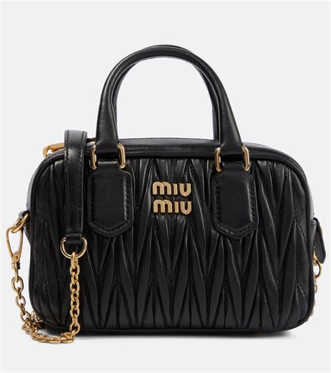 miu miu bandoliera matelasse crossbody black|Matelassé leather crossbody bag Miu Miu Black in Leather.